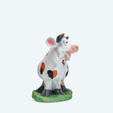 Корова веселая